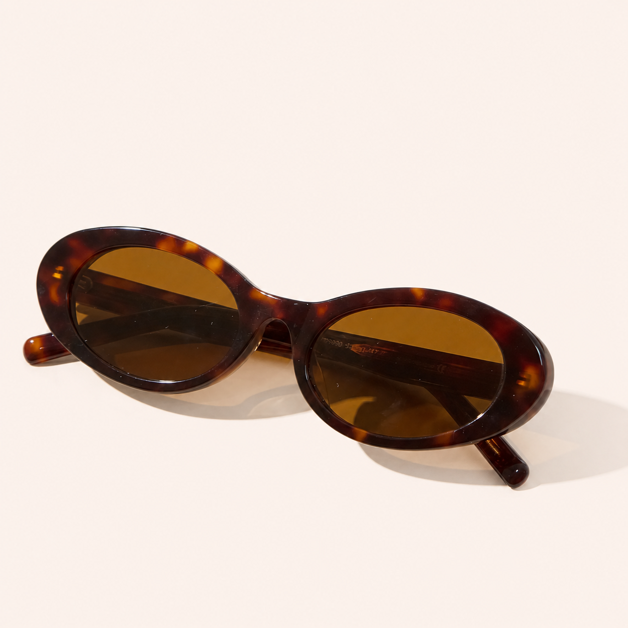 Tortoise oval sunglasses with brown lenses representing Le Seven oval frames