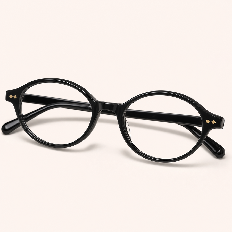 Black round eyeglasses with gold diamond rivets representing Le Seven round frames