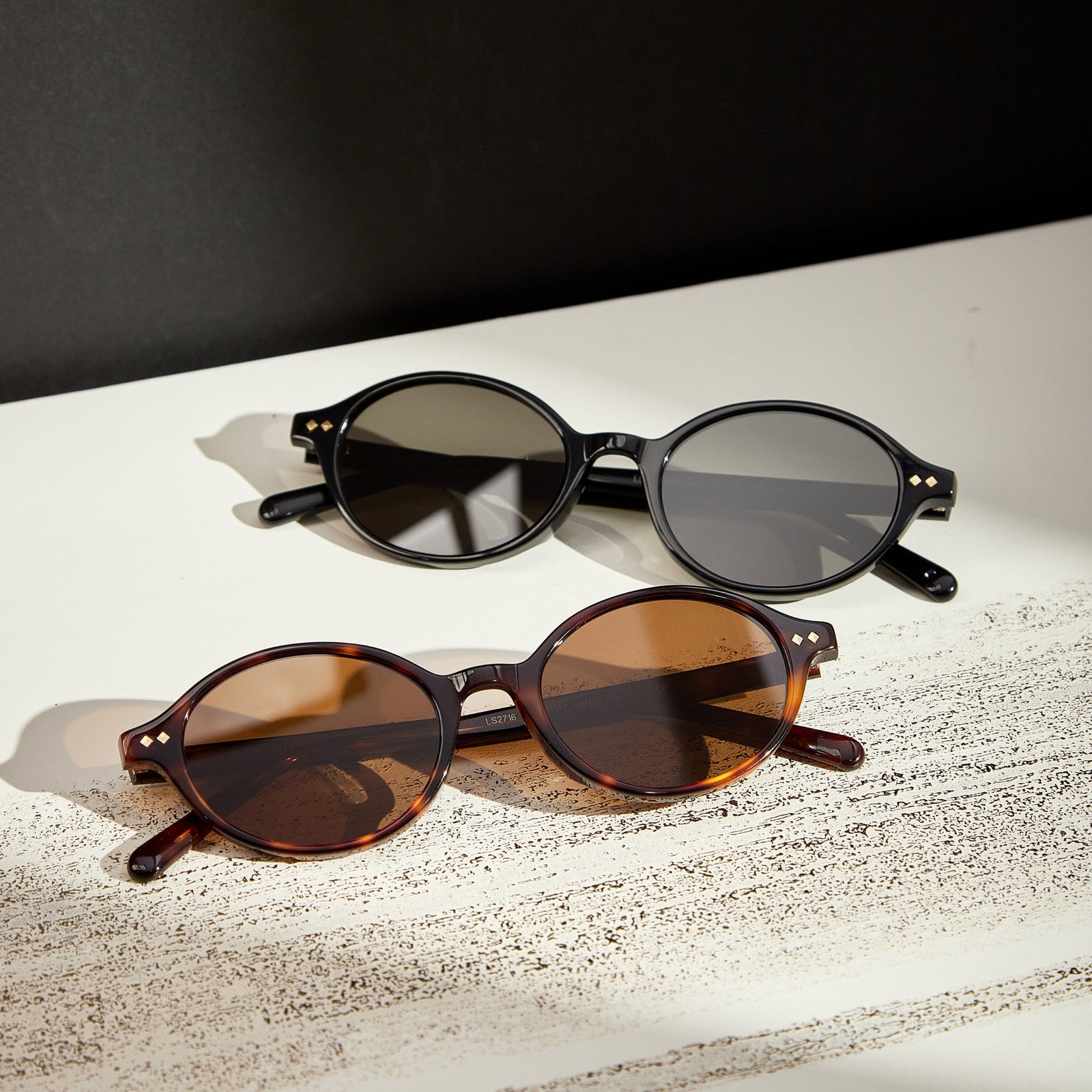 Isla Black and Brown Tortoise oval sunglasses displayed together