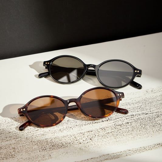 Isla Black and Brown Tortoise oval sunglasses displayed together