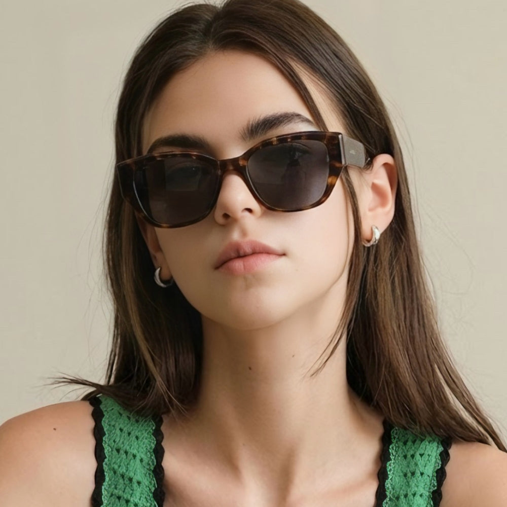 Model wearing Lilly Brown Tortoise cat-eye polarized sunglasses