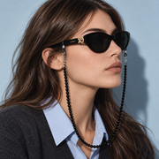 Model wearing the Black beaded eyeglass chain with Mira Black sunglasses