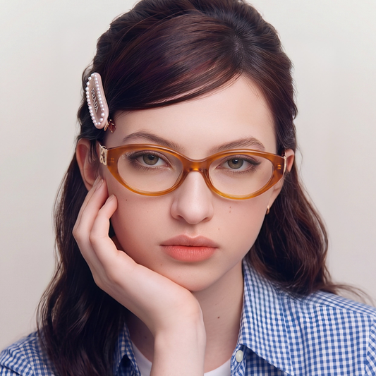 Model wearing Kora Pumpkin cat-eye eyeglasses