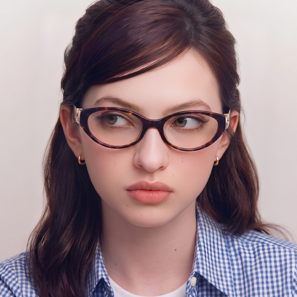 Model wearing Kora Tortoise cat-eye eyeglasses