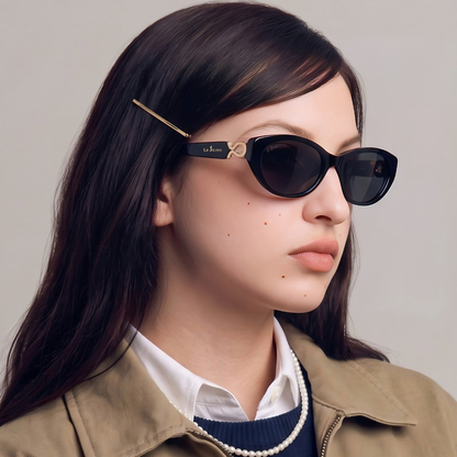 Model wearing Kora Black cat-eye sunglasses