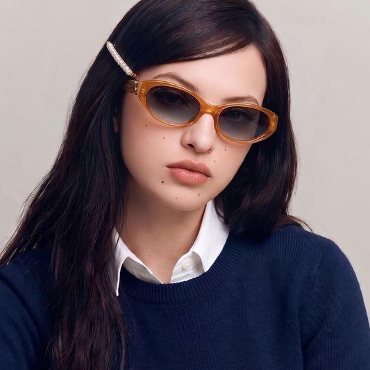 Model wearing Kora Pumpkin cat-eye sunglasses