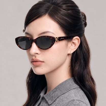 Model wearing Kora Tortoise cat-eye sunglasses