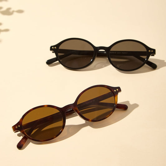 Isla Black and Brown Tortoise oval sunglasses styled together
