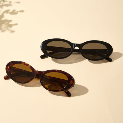 Jade Black and Brown Tortoise oval sunglasses styled together