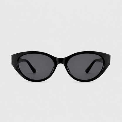 Mira Black sunglasses, front view on a light gray background.