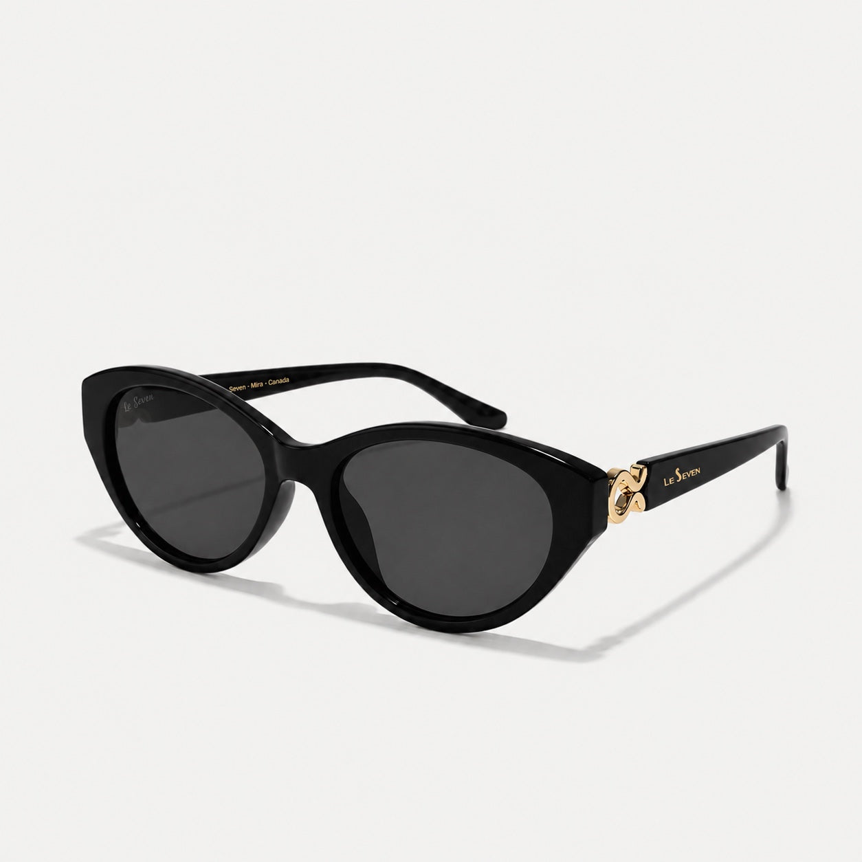 Mira Black sunglasses, three-quarter front-side view on a light gray background.