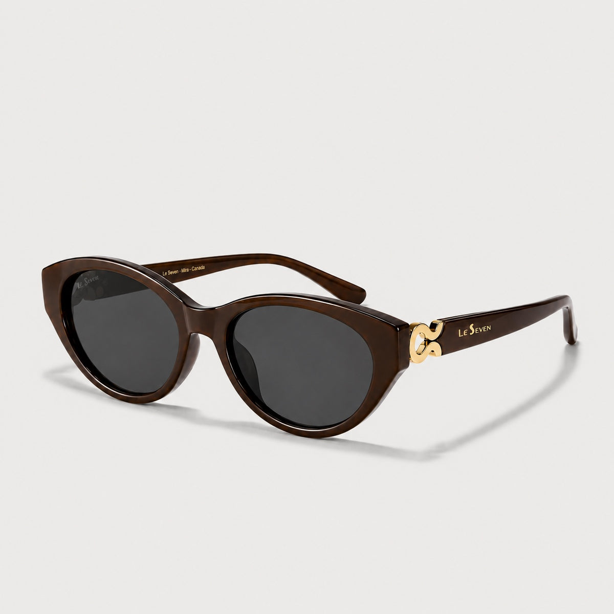 Mira Brown sunglasses, three-quarter front-side view on a light gray background.