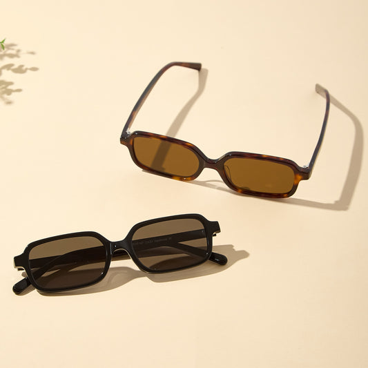 Ryan Black and Brown Tortoise rectangular sunglasses styled in sunlight