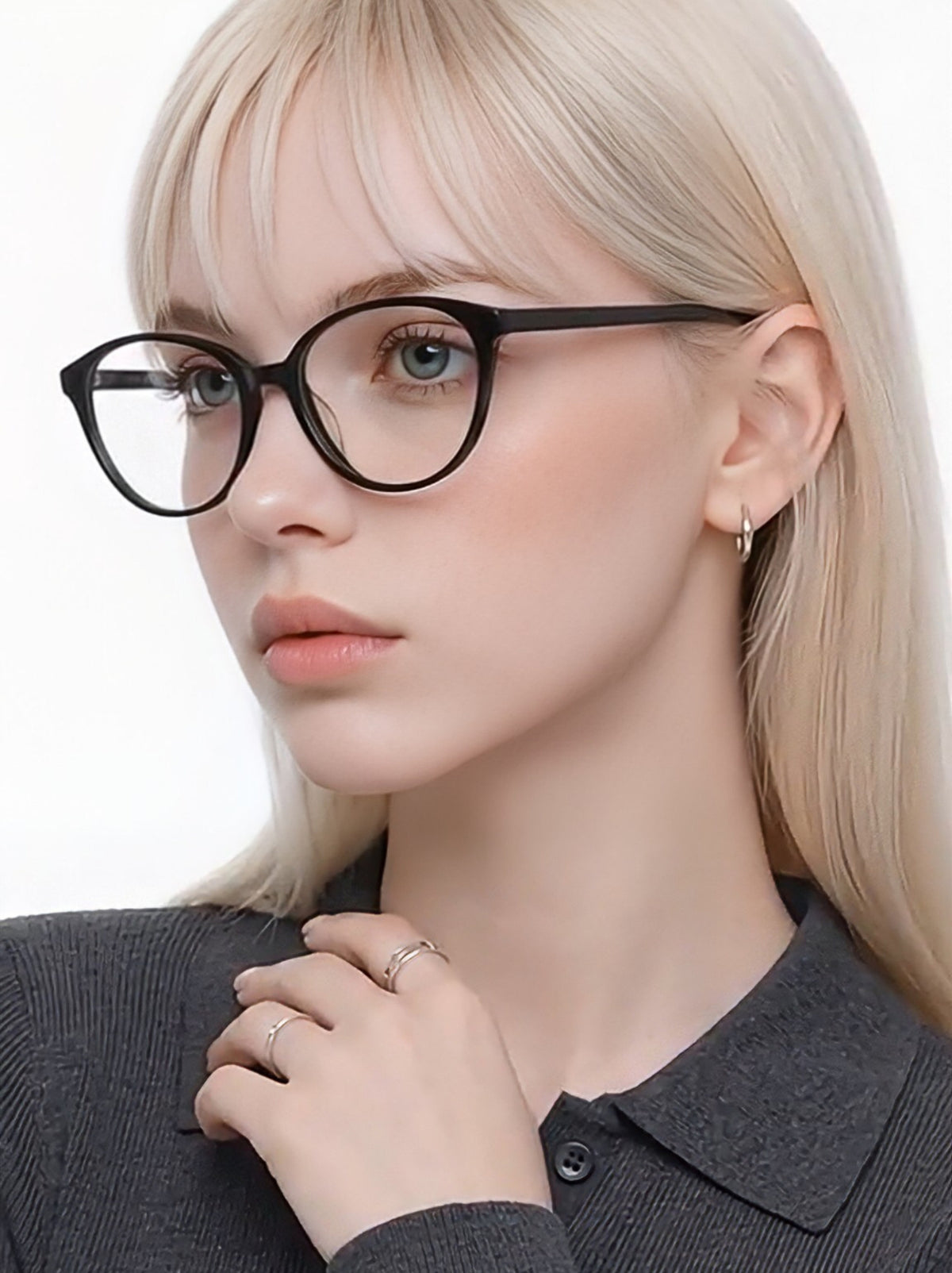 Model wearing Sienna Black cat-eye glasses, three-quarter portrait