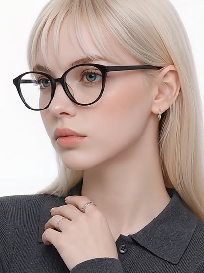 Model wearing Sienna Black cat-eye glasses, three-quarter portrait