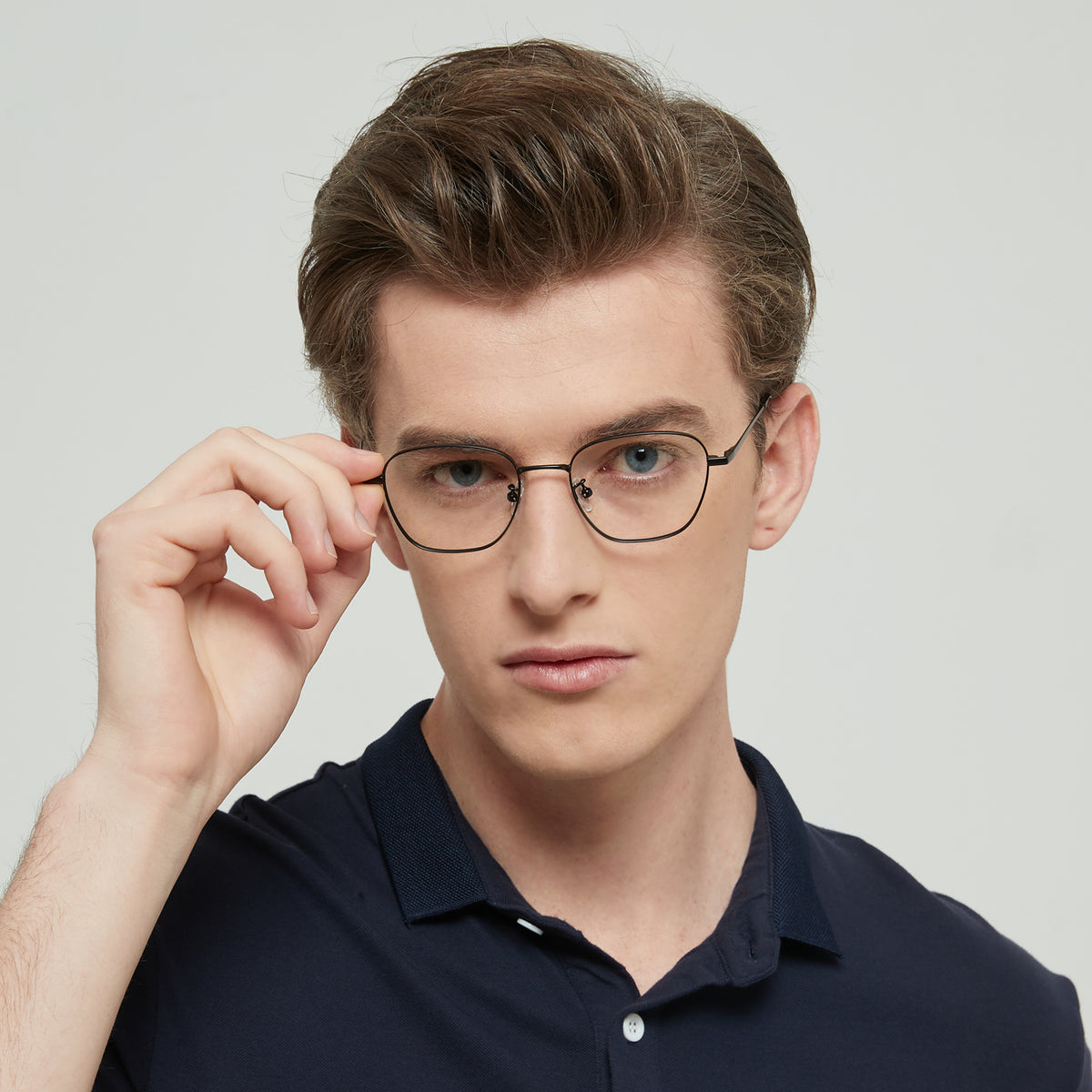 Titanium Matt Black optical frames, worn by a model